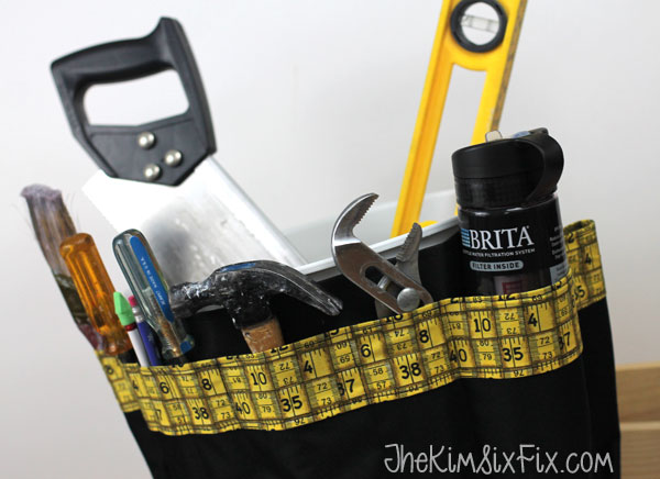 Canvas tool organizer ties on bucket
