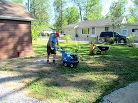 1508001 Aug 01 Terry With Rented Sod Cutter