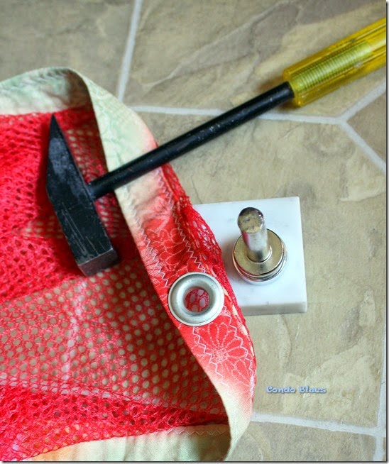 how to use eyelet grommet tool