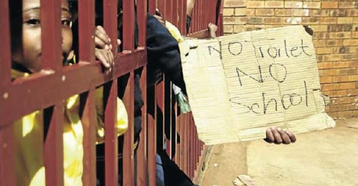 Pupils at Tholimfundo Primary School, in Protea Glen,Soweto, boycotted classes yesterday to protest against lack of ablution facilities at the school Picture: THULANI MBELE