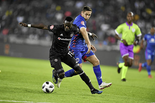 Augustine Mulenga of Orlando Pirates and Dean Furman of SuperSport United.