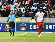 Referee Abongile Tom sends Bienvenu Eva Nga off during Chippa United’s Nedbank Cup semifinal game against Pirates in Gqeberha on Saturday