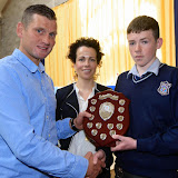 Shaun McFadden, and Fiona Temple presenting Eoin McGonigle with the Junior Sports Student of the Year Award at the Mulroy College Junior Prize Giving.   Photo:- Clive Wasson