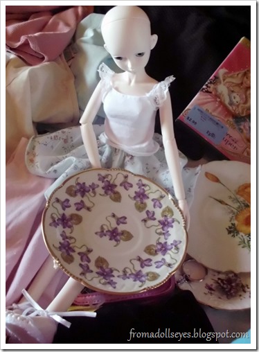 bjd admiring vintage dishware