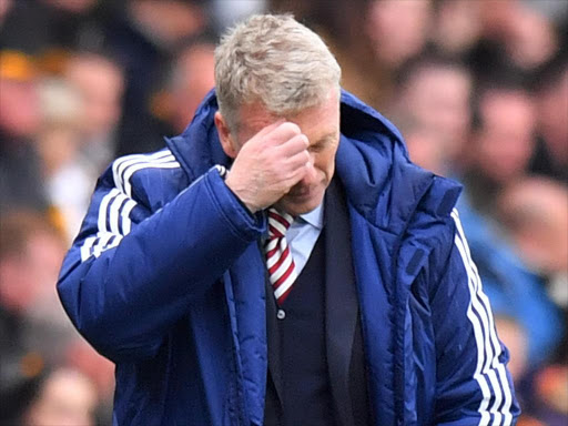 Sunderland manager David Moyes looks dejected during a match against Hull City at the Kingston Communications Stadium, May 17, 2017. /REUTERS