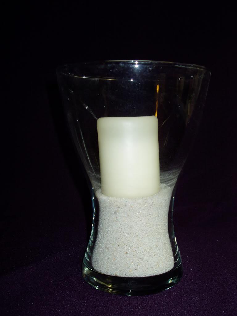 6 x vases with decorative sand and candle -  2 each  or all for  10 