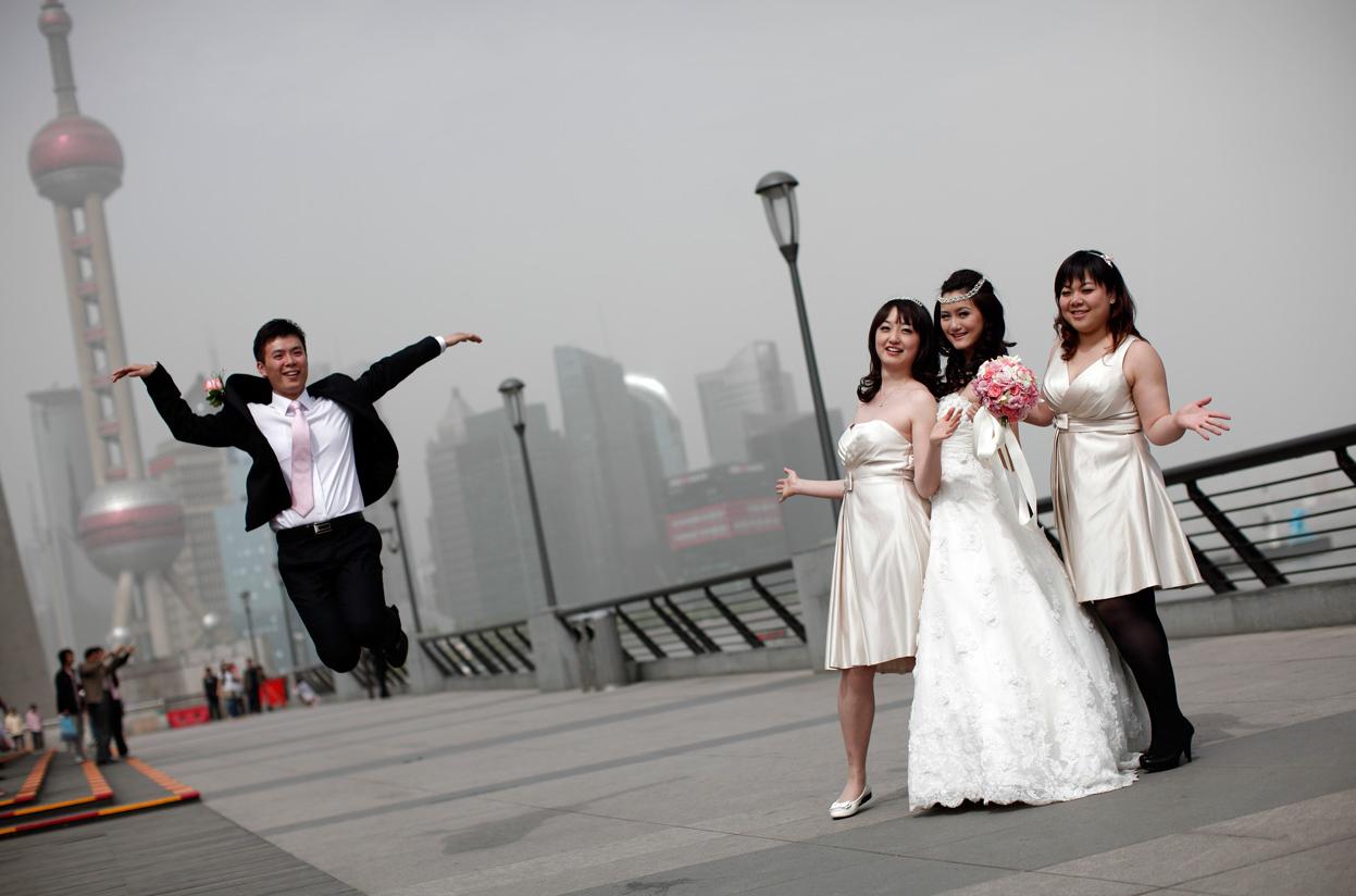 37. A wedding party poses for