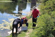 SAPS Free State divers recover the body of a sangoma who drowned during a healing water ritual on Friday, 15 December. 