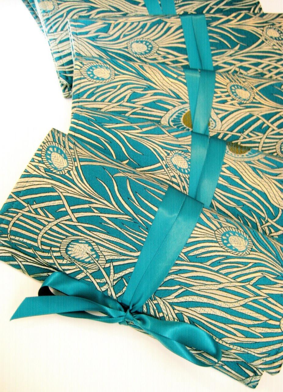 Bridesmaids Clutches in turquoise peacock feather silk