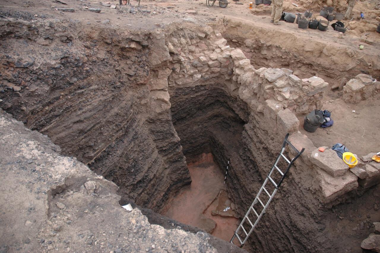 Industrial copper slag mound 76 m in depth excavated at KEN.