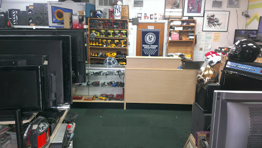 Pawn Shop «Tampa Gun & Pawn», reviews and photos, 12319 N Nebraska Ave, Tampa, FL 33612, USA