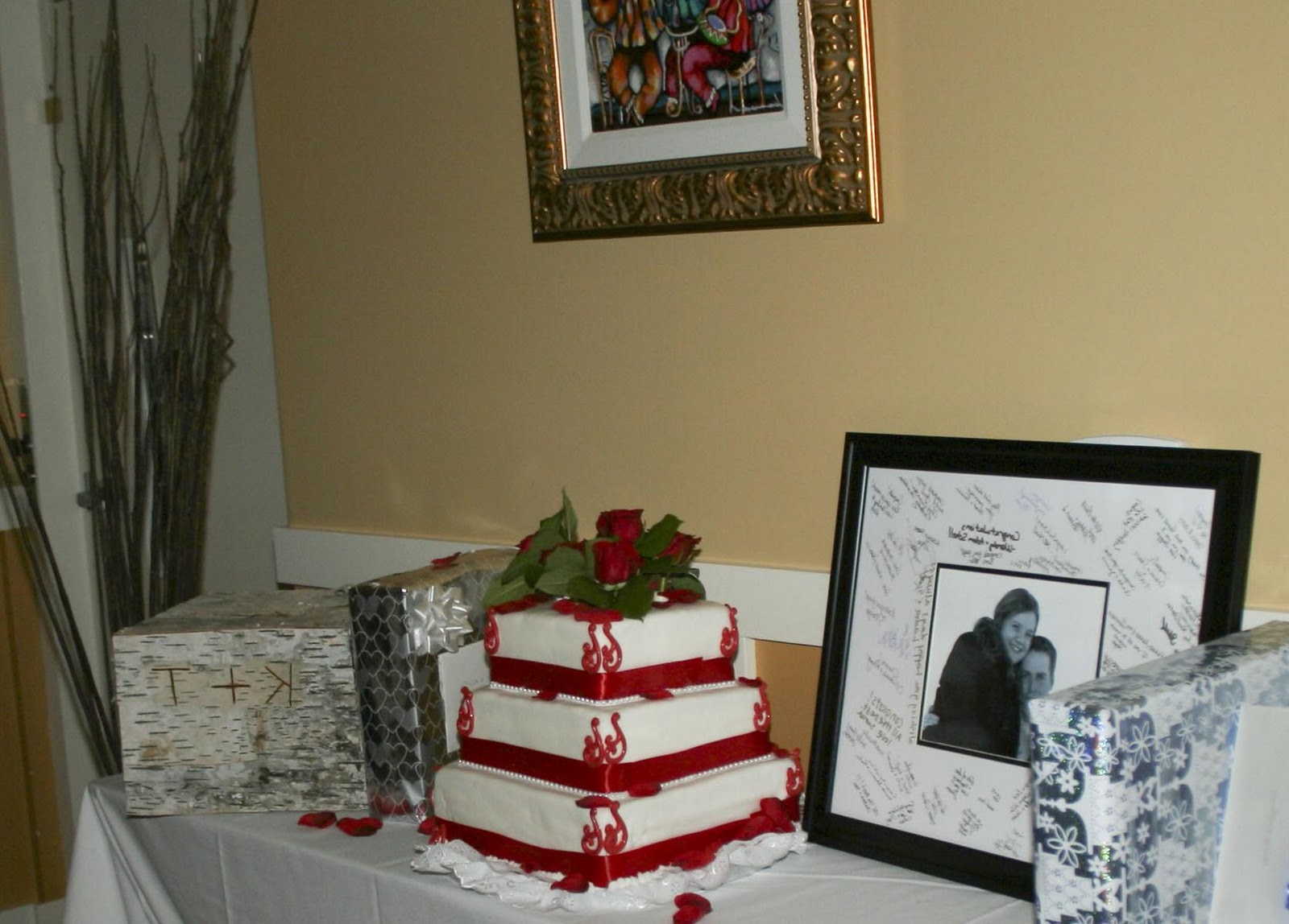 Gorgeous winter wedding sign-in cake gift table in Muskoka.