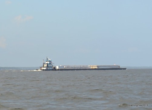 A barge transporting bridge pieces
