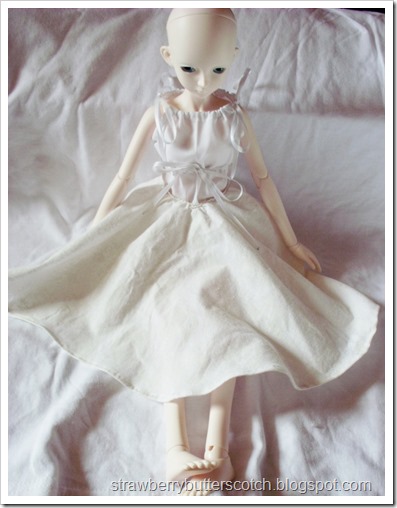 Bjd in an offwhite circle skirt with alternate waistband