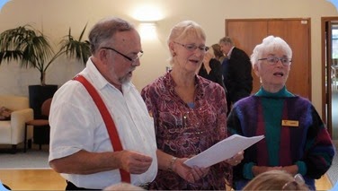 Bjorn and Lena Simonsen accompanied by Audrey Henden (right) singing whilst we ate our delicious lunch. Photo courtesy of Dennis Lyons.