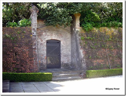 The remains of the wall to the Lunatic Asylum with early graffiti.