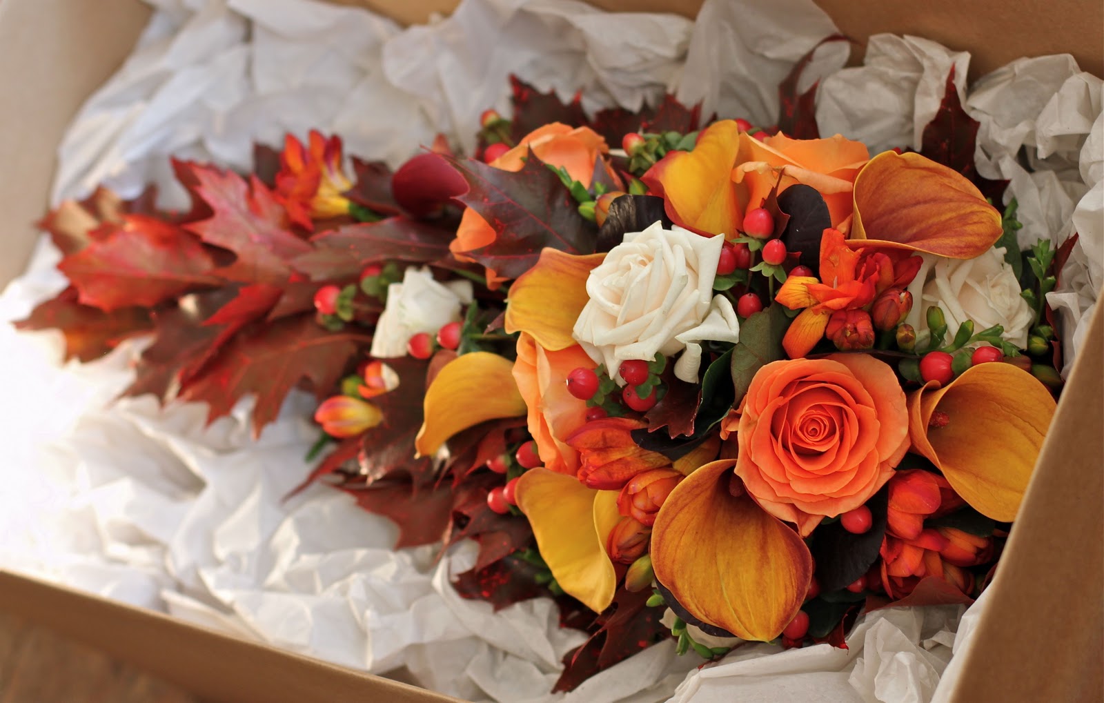 calla lilies, mixed roses,