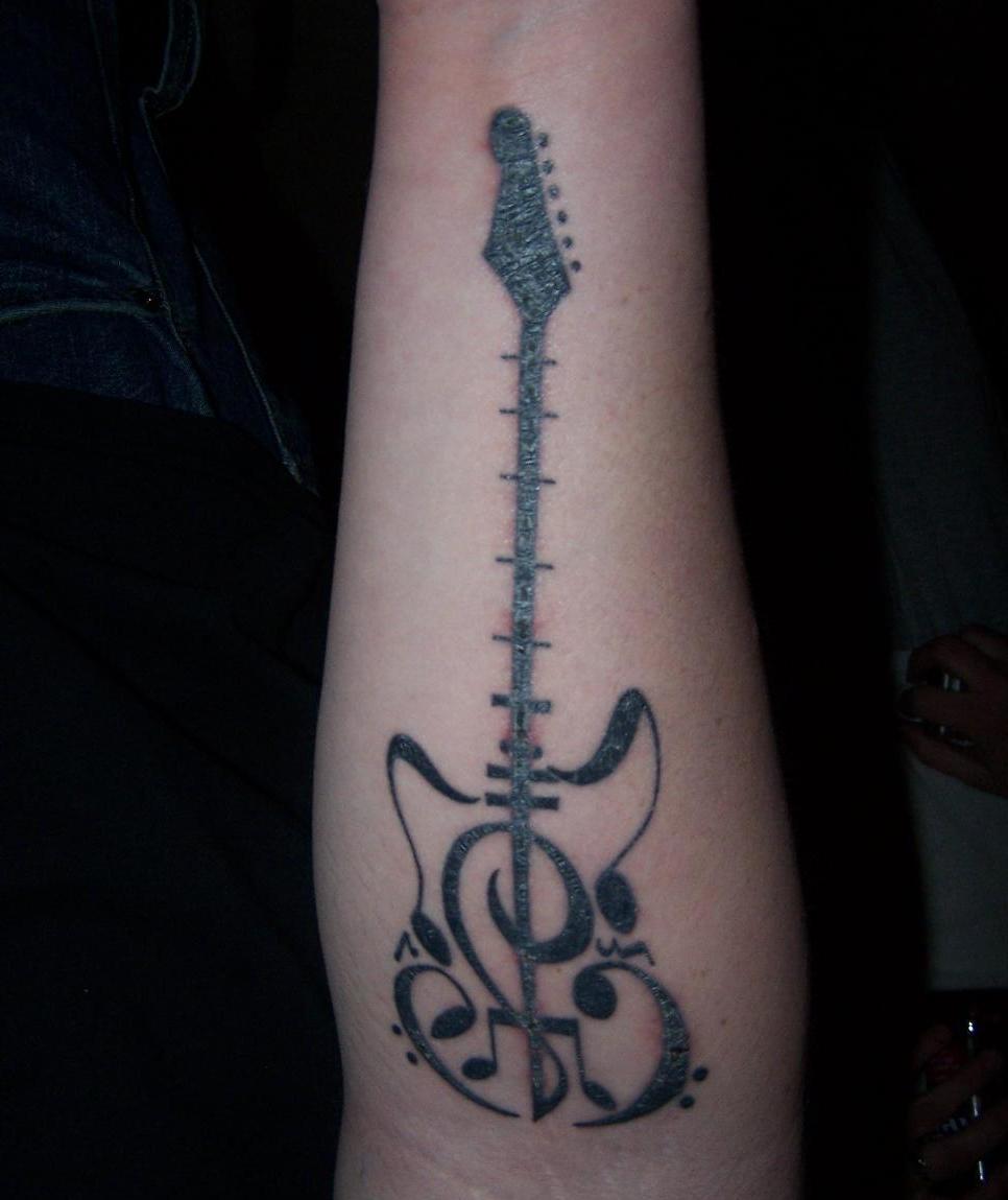 Guitar Tattoo Design in Arm 