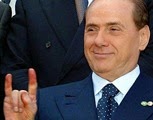 Berlusconi fa le corna
