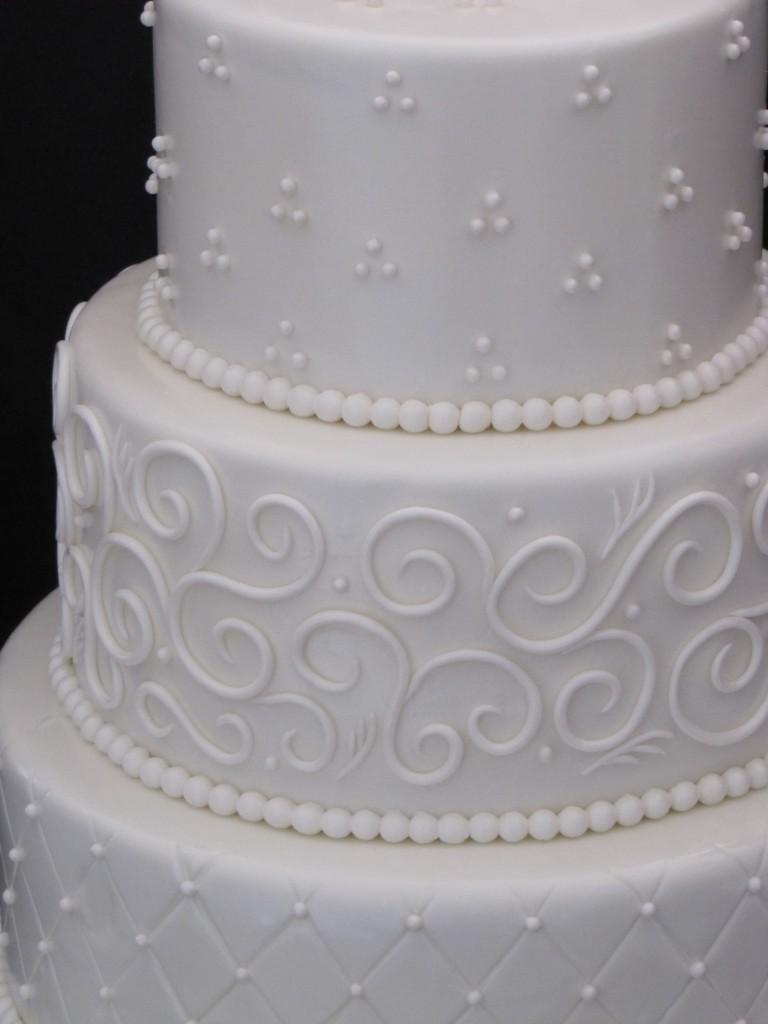 white and purple wedding cakes