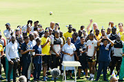 Kaizer Chiefs players and staff celebrates the Chairman and owner of Kaizer Chiefs Kaizer Motaung birthday during the Kaizer Chiefs media open day at Kaizer Chiefs Village on October 16, 2019 in Johannesburg, South Africa. 