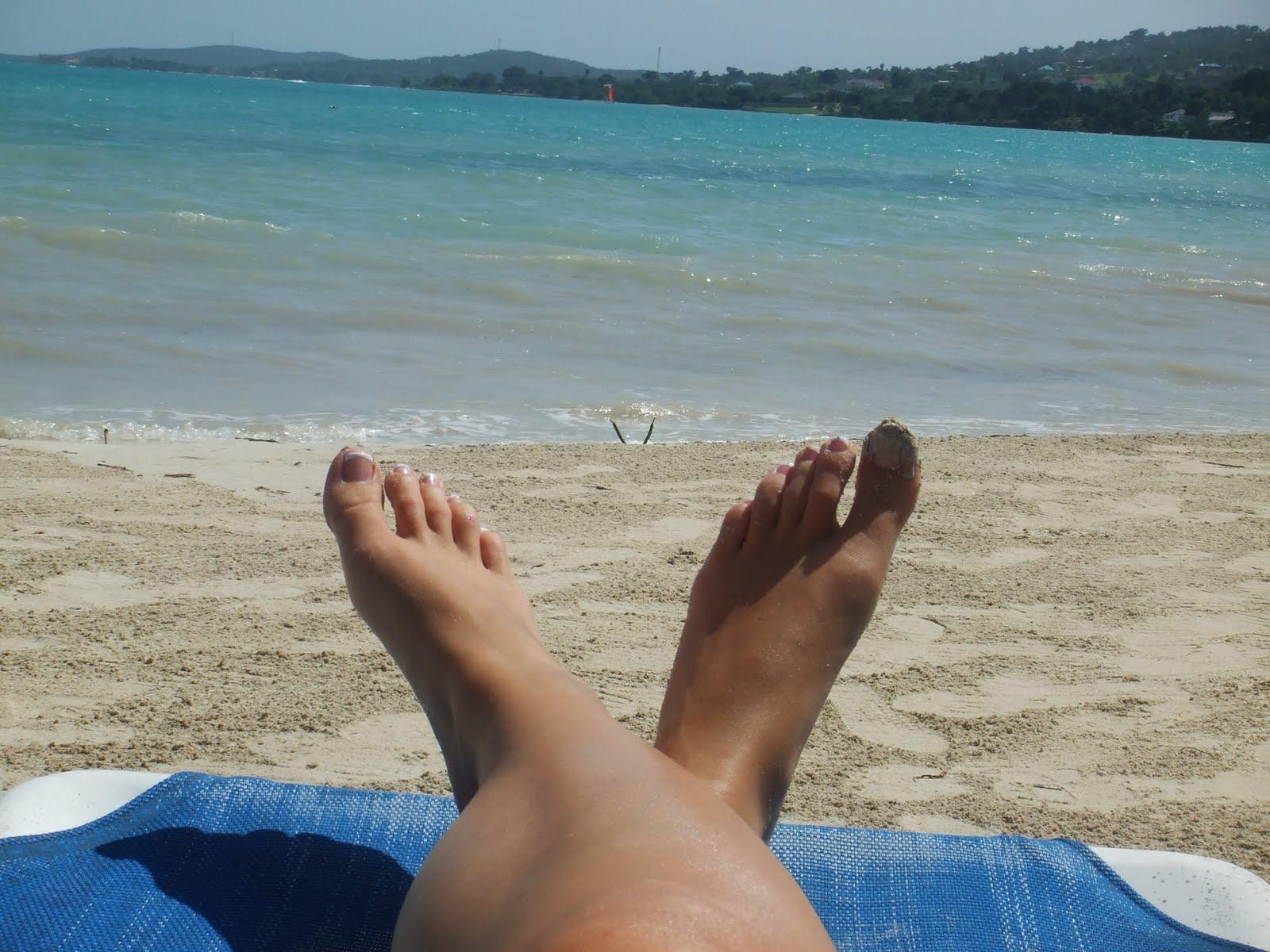 ankles tanning in Jamaica.