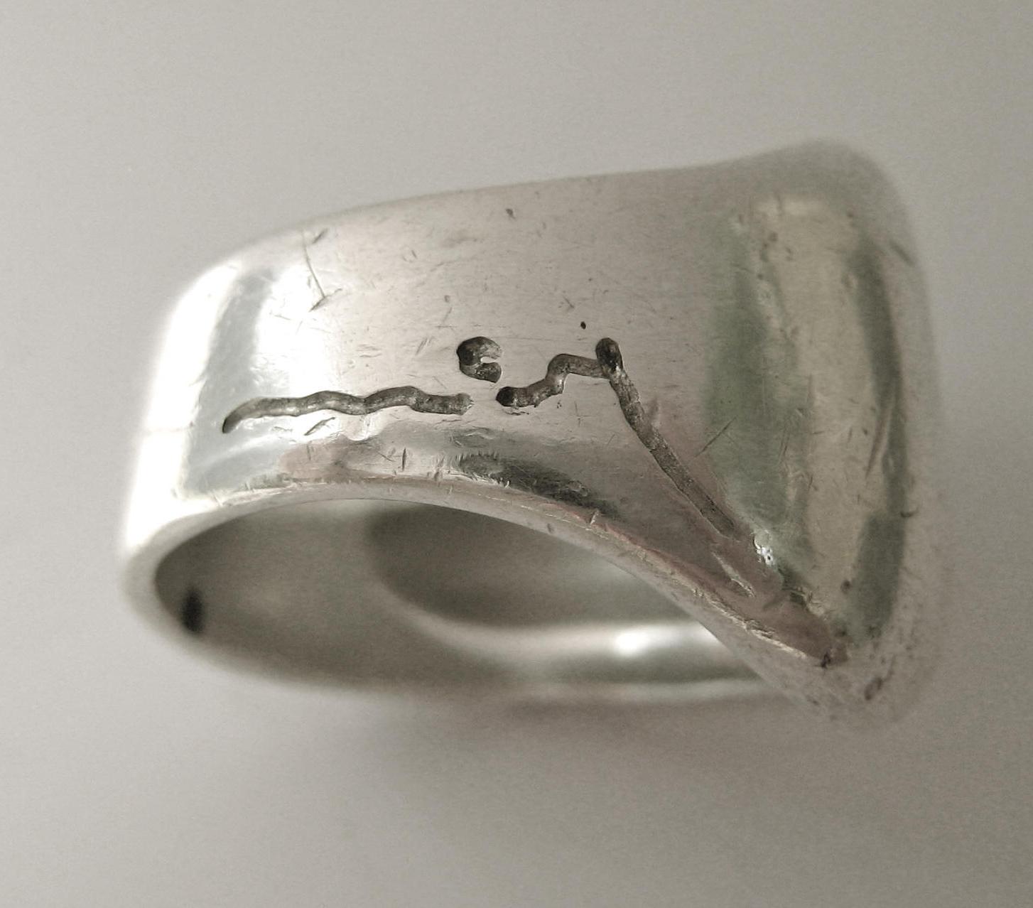 This mark is from a modernist sterling ring by Georg Jensen.