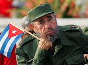 Cuban President Fidel Castro listens to a speaker during the May Day parade in Havana's Revolution Square. Photo:  REUTERS/Claudia Daut
