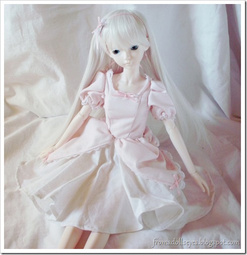 Ball Jointed Doll Showing off Her New Pink Dress