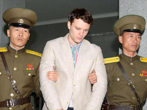 Otto Frederick Warmbier (C), a University of Virginia student who was detained in North Korea since early January, is taken to North Korea's top court in Pyongyang, North Korea, in this photo released by Kyodo March 16, 2016. Mandatory credit REUTERS/Kyodo/File