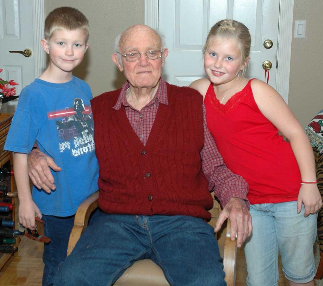 Ken with his grandkids,