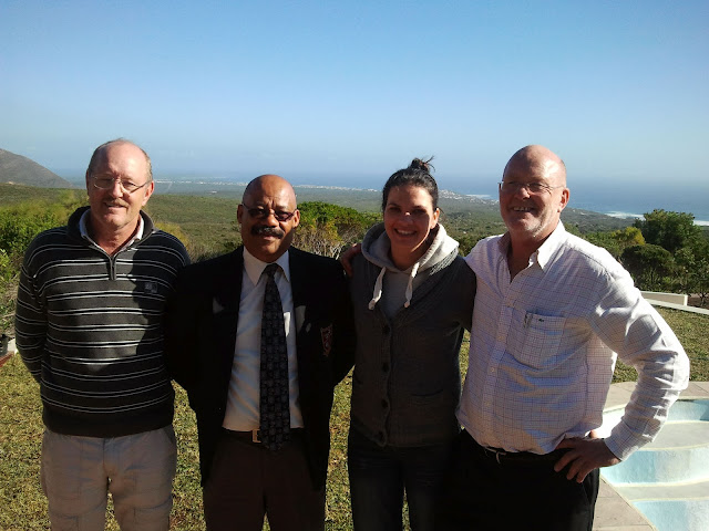 Tertius Lutzeyer, Tommy Wilson, Leán Terblanche, Michael Lutzeyer at Grootbos Private Nature Reserve with the stunning Walker Bay in the background.