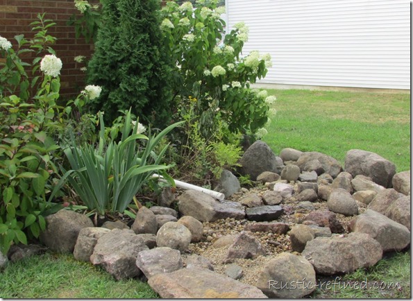 Dumping sump pump water into a dry creek bed @ Rustic-refined.com
