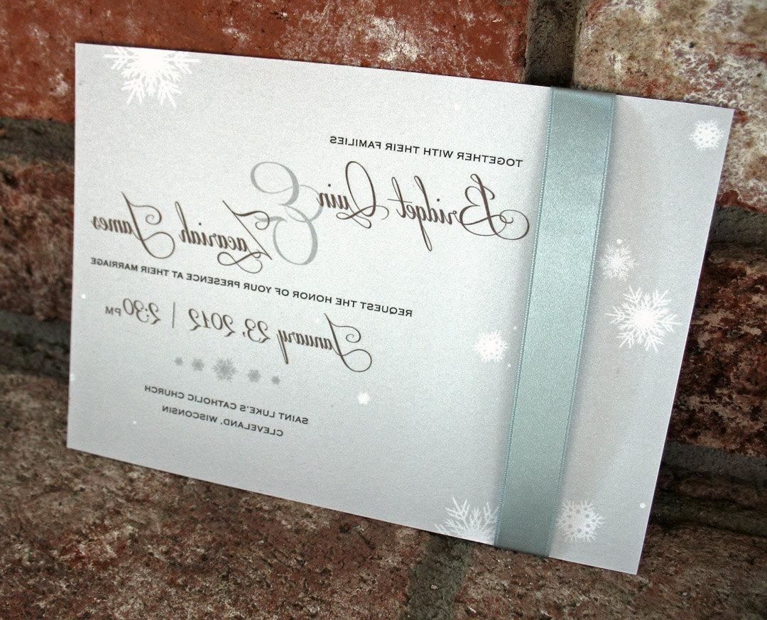 Winter Wedding Invitation with snowflakes and ribbon