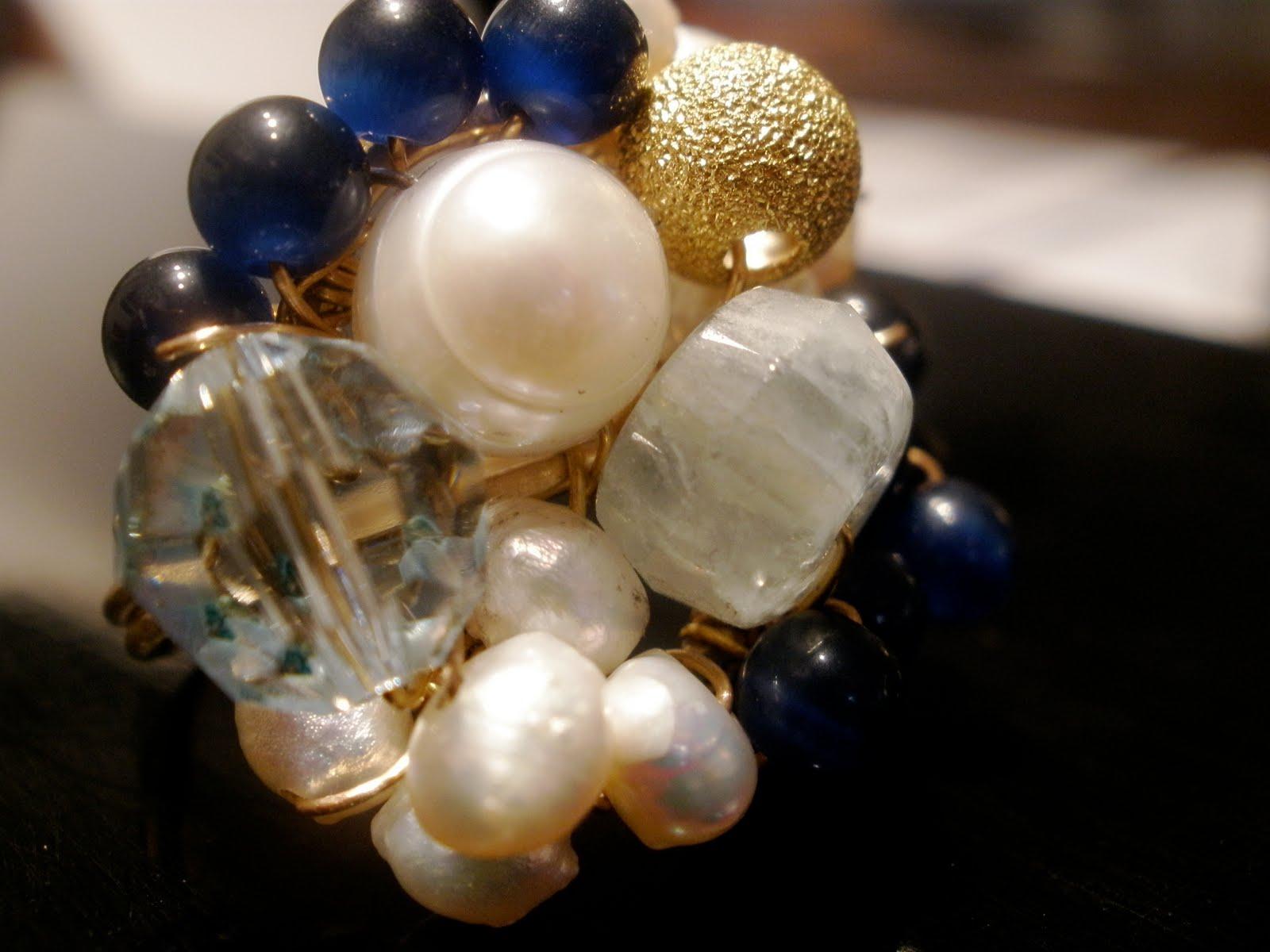 Gold, aquamarine, pearls, navy