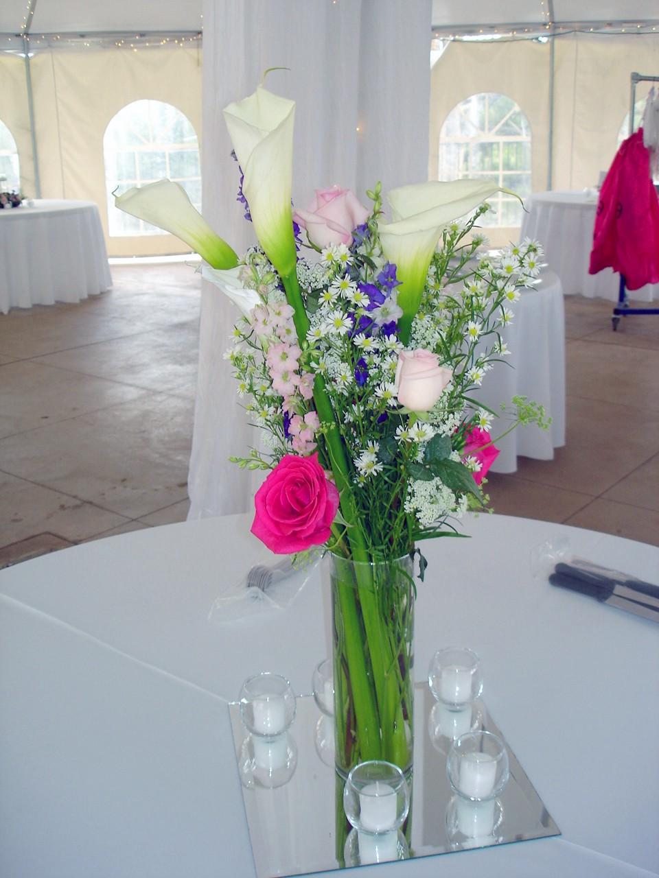 A tall centerpiece with calla