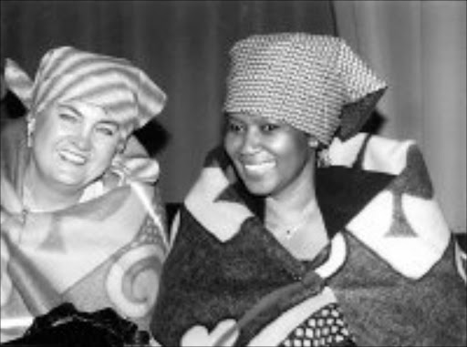 GOOD JOB: Deputy President Phumzile Mlambo-Ngcuka, right, and Susan de Jager at the opening of an orphanage in Namahadi. Pic. Len Kumalo. 06/08/07. © Sowetan.