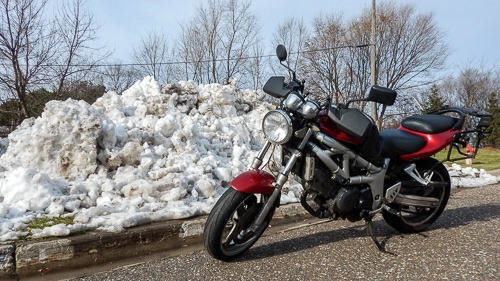 SV650 Next to Snow Bank Winter Motorcycle Riding