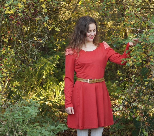 wearing a red dress in autumn