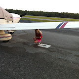 Untying the plane for our trip home from Destin FL 03242012a