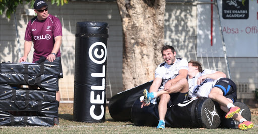 Cobus Reinach (C) happy to be back during the Cell C Sharks training and interview session at Growthpoint Kings Park on October 07, 2014 in Durban, South Africa.