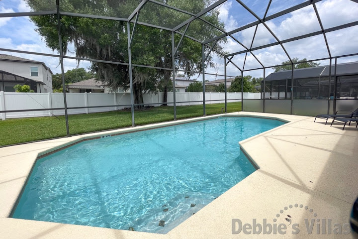 Secluded west-facing private pool at this Kissimmee vacation villa