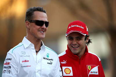 улыбающиеся Михаэль Шумахер и Фелипе Масса на Гран-при Кореи 2012
