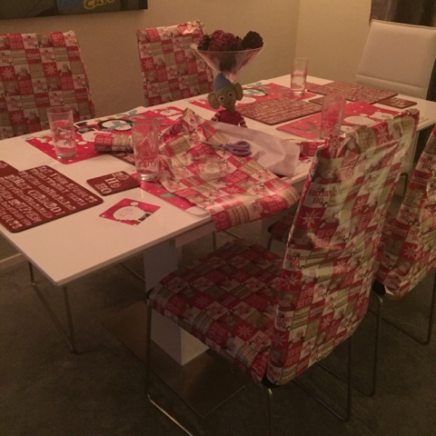 elf on the shelf wrapping up chairs