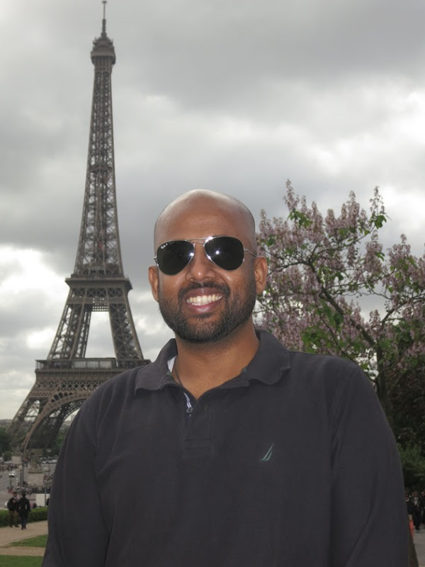 In front of Eiffel Tower, Paris