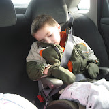 Bryan taking a little cat nap in our rental car in St Louis 03192011