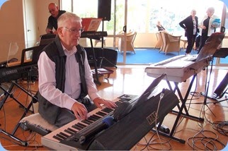 Gordon Sutherland playing his Korg Pa3X. Photo courtesy of Dennis Lyons.