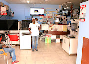 Founder and managing director of Third Century Computing Ndaelo Tshikovhi in his shop in Thohoyandou, Limpopo.