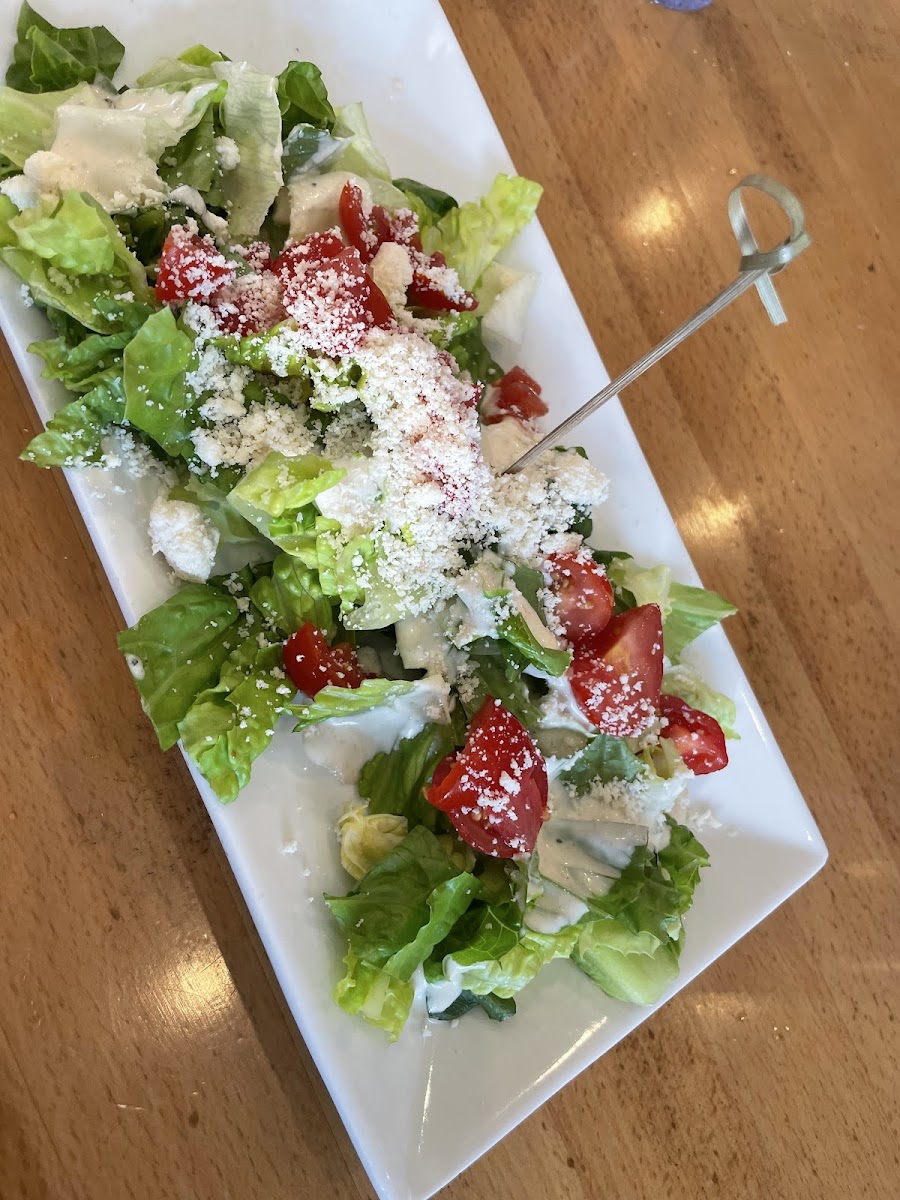 Cesar salad with tomatoes. Every allergen plate comes out with the little wooden stick. That is how you know it came from the allergen kitchen