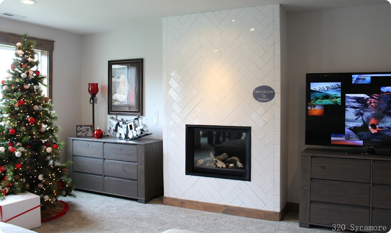 horizontal fireplace with herringbone tile